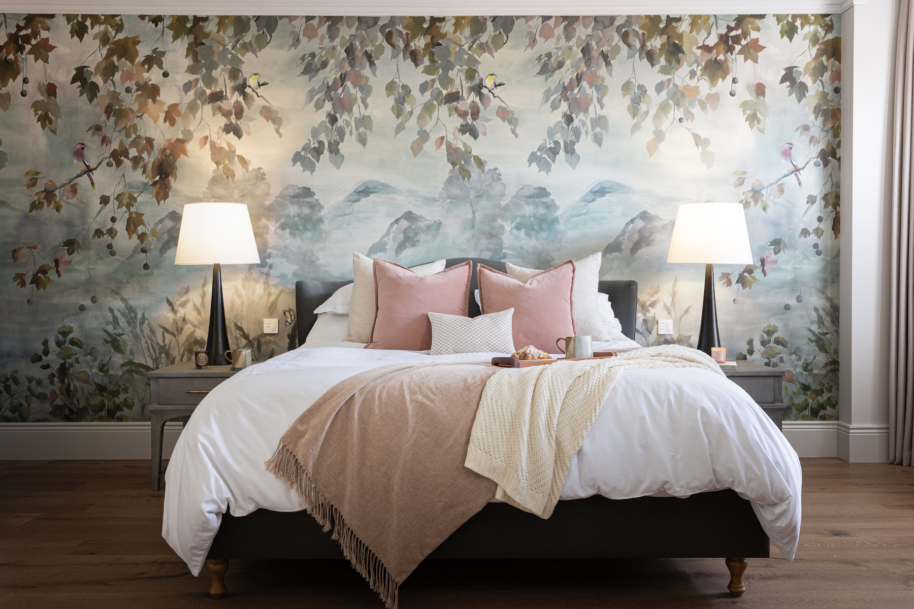 Contemporary Bedroom Designed with Bespoke headboard and Mural Wallpaper by Pfeiffer Design. Neutral colour palette with warm lighting design